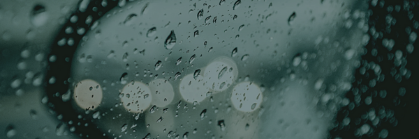 “Raindrops falling on a countryside road, symbolize reflection and hidden life lessons.” Close-up of raindrops on a window glass, evoking moments of introspection and mindfulness.” “Wet landscape after a rain shower, capturing the fleeting beauty and life lessons.”